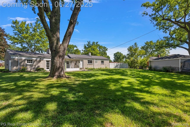 4550 Justine St, Shelby Twp, MI 48317 - back of house with brick siding