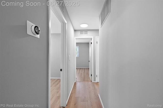 4550 Justine St, Shelby Twp, MI 48317 - hall featuring light wood finished floors and baseboards