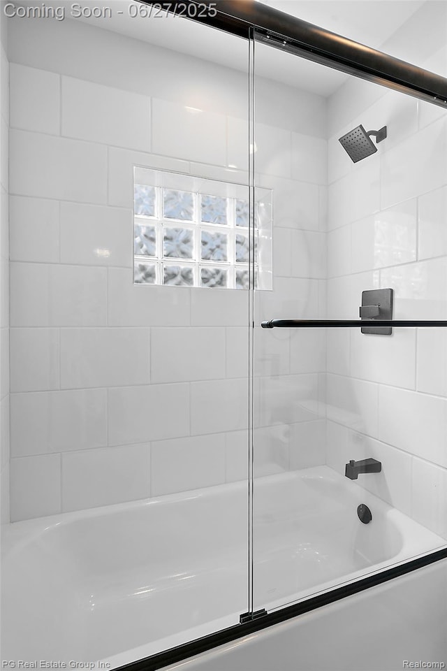 4550 Justine St, Shelby Twp, MI 48317 - full bathroom featuring shower / bath combination with glass door
