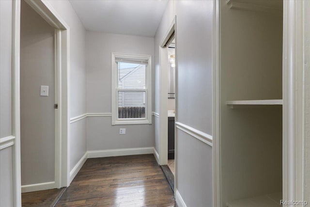 192 W Hopkins Ave, West Bloomfield, MI 48340 - corridor featuring dark wood-style flooring and baseboards