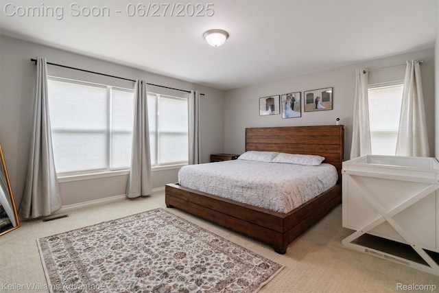 11785 Cardwell St, Dearborn Heights, MI 48150 - bedroom featuring light carpet and baseboards