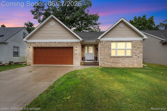 11785 Cardwell St, Dearborn Heights, MI 48150 - ranch-style house featuring brick siding, an attached garage, a front lawn, and concrete driveway