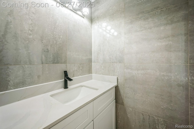 1730 E Woodruff Ave, Hazel Park, MI 48030 - bathroom with vanity and tile walls