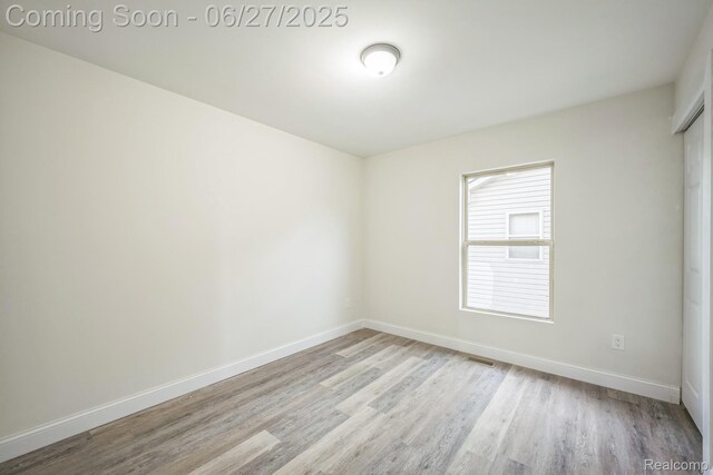 1730 E Woodruff Ave, Hazel Park, MI 48030 - empty room featuring wood finished floors and baseboards