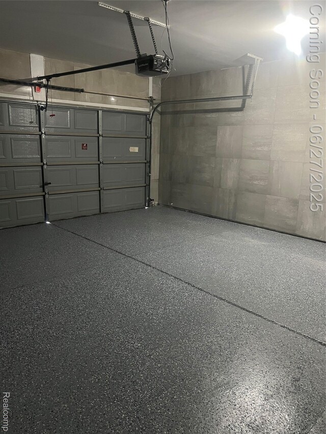 1730 E Woodruff Ave, Hazel Park, MI 48030 - garage featuring a garage door opener