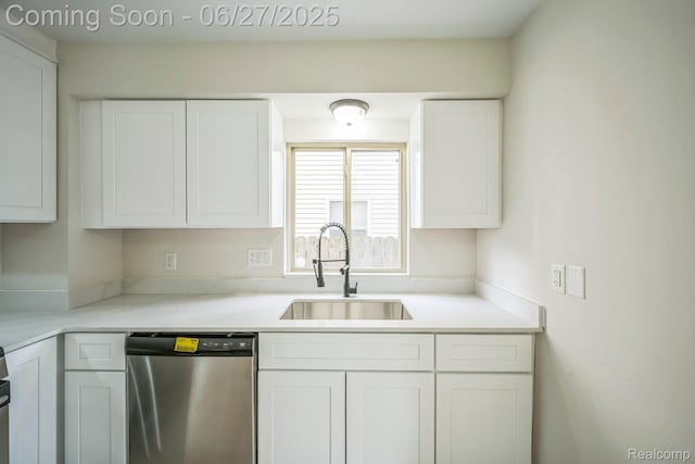 1730 E Woodruff Ave, Hazel Park, MI 48030 - kitchen featuring stainless steel dishwasher, white cabinets, and light countertops