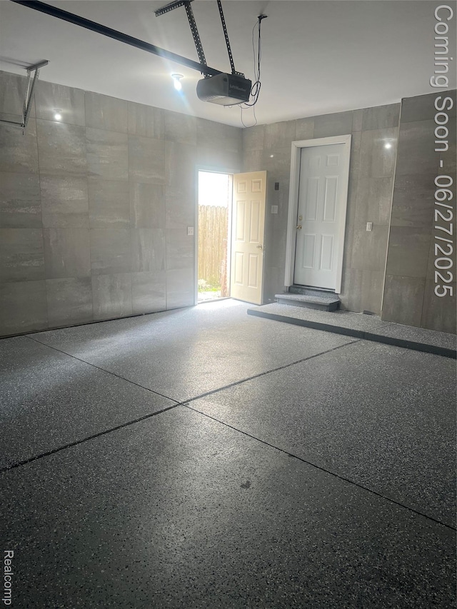 1730 E Woodruff Ave, Hazel Park, MI 48030 - garage featuring a garage door opener