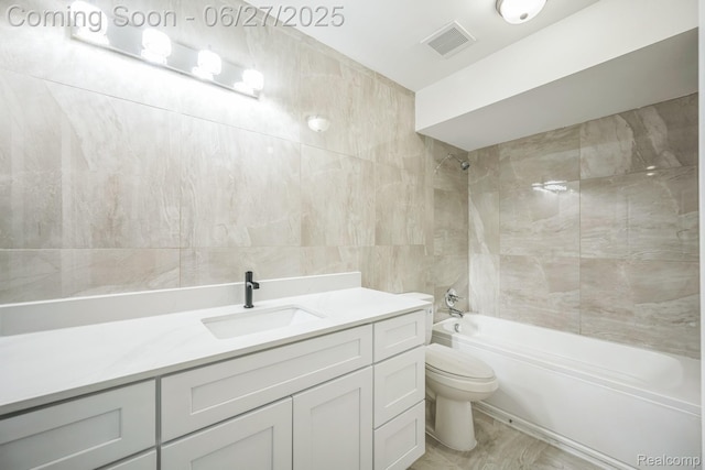 1730 E Woodruff Ave, Hazel Park, MI 48030 - full bath featuring tile walls, shower / washtub combination, and vanity