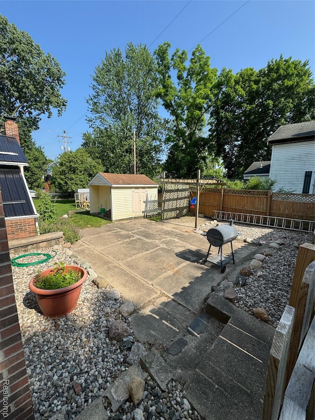 338 Green, Perry, MI 48872 - view of patio / terrace featuring a storage unit