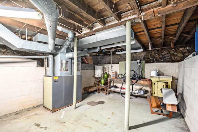317 E Chart St, Plainwell, MI 49080 - unfinished basement featuring heating unit
