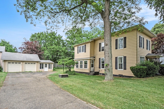 317 E Chart St, Plainwell, MI 49080 - view of front of property featuring entry steps, a front lawn, asphalt driveway, and an attached garage