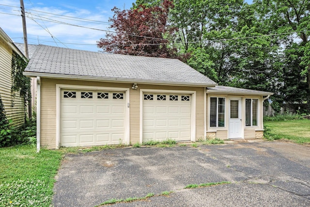 317 E Chart St, Plainwell, MI 49080 - garage with asphalt driveway