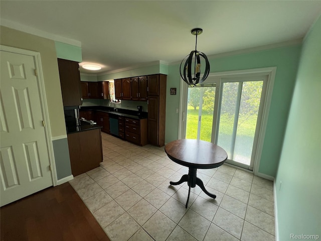 6197 Sober Rd, Fowlerville, MI 48836 - kitchen featuring dark countertops, dark brown cabinets, dishwasher, a chandelier, and pendant lighting