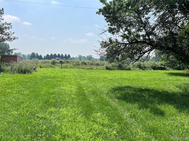 6197 Sober Rd, Fowlerville, MI 48836 - view of yard featuring a view of countryside
