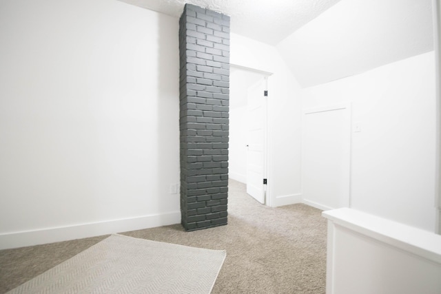 1100 W Laketon Ave, Muskegon, MI 49441 - additional living space with light carpet and lofted ceiling