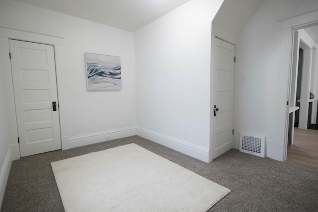 1100 W Laketon Ave, Muskegon, MI 49441 - carpeted spare room featuring baseboards