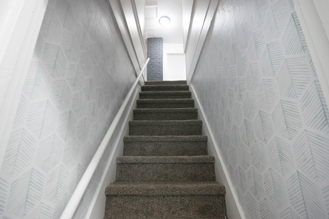 1100 W Laketon Ave, Muskegon, MI 49441 - staircase featuring wallpapered walls
