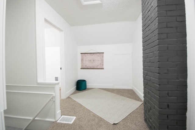 1100 W Laketon Ave, Muskegon, MI 49441 - washroom with carpet flooring and baseboards