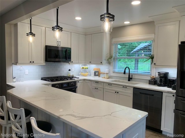1485 Paramount St, Novi, MI 48377 - kitchen featuring black appliances, white cabinets, light stone countertops, decorative backsplash, and recessed lighting