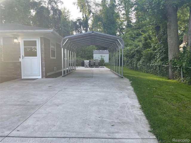 1485 Paramount St, Novi, MI 48377 - view of vehicle parking with driveway and a carport