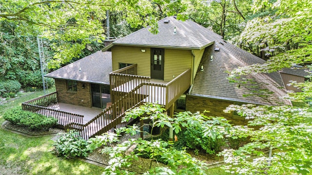 1769 Maple Ln, Benton Harbor, MI 49022 - rear view of property with roof with shingles, a wooden deck, stairs, and brick siding