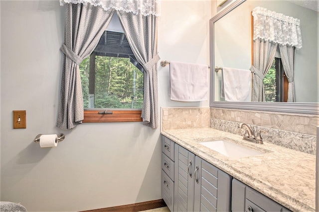 1769 Maple Ln, Benton Harbor, MI 49022 - bathroom featuring vanity and baseboards