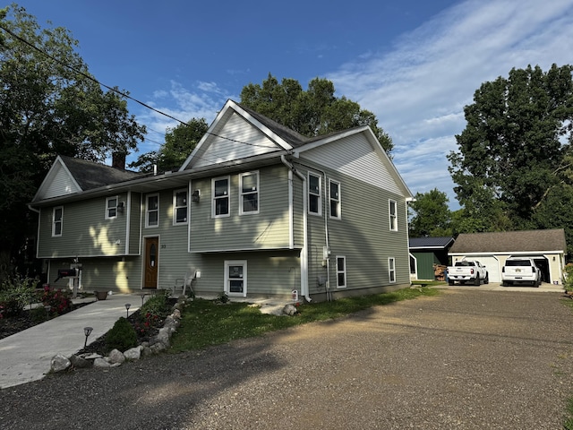 313 N Matteson St, Bronson, MI 49028 - split foyer home featuring a chimney