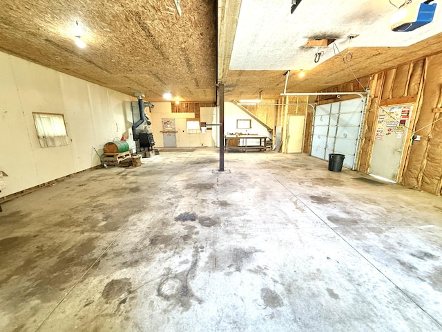 10844 Judd Rd, Willis, MI 48191 - garage featuring a garage door opener