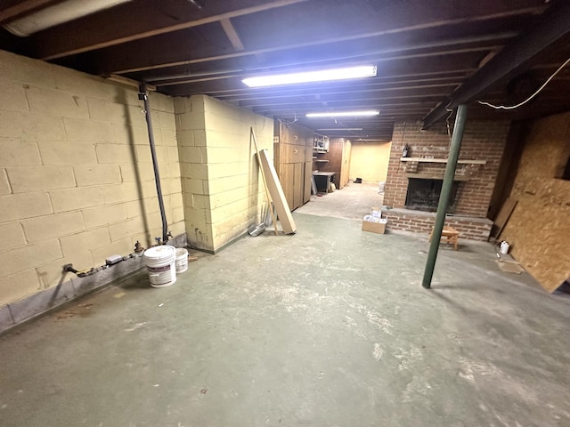 10844 Judd Rd, Willis, MI 48191 - unfinished below grade area featuring a fireplace