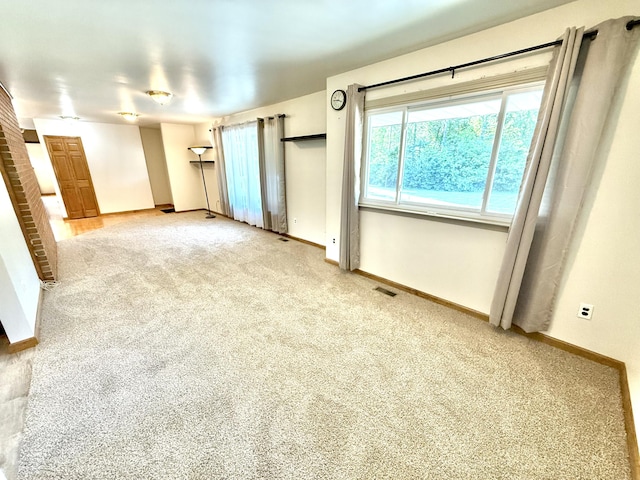 10844 Judd Rd, Willis, MI 48191 - spare room featuring carpet