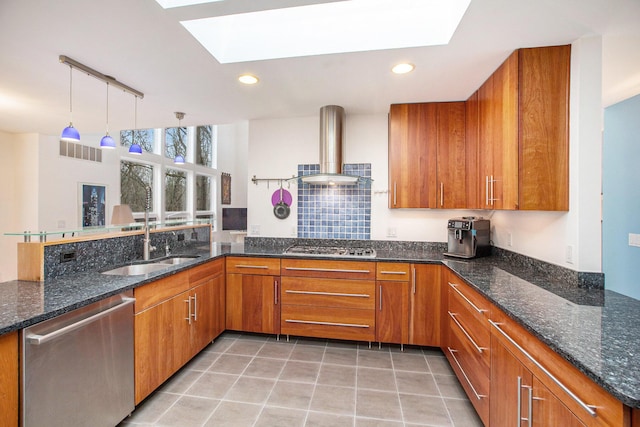 8023 Trail Rdg, Dexter, MI 48130 - kitchen featuring appliances with stainless steel finishes, a skylight, island exhaust hood, brown cabinets, and recessed lighting