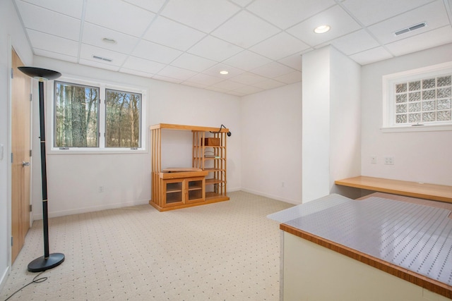 8023 Trail Rdg, Dexter, MI 48130 - basement with a paneled ceiling, plenty of natural light, and carpet flooring