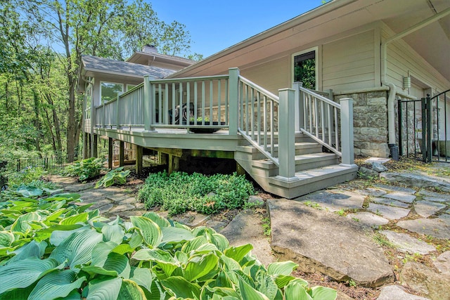 8023 Trail Rdg, Dexter, MI 48130 - view of property exterior featuring a deck and stone siding