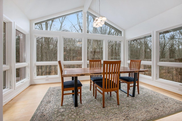 8023 Trail Rdg, Dexter, MI 48130 - sunroom / solarium featuring healthy amount of natural light, wood finished floors, and a chandelier