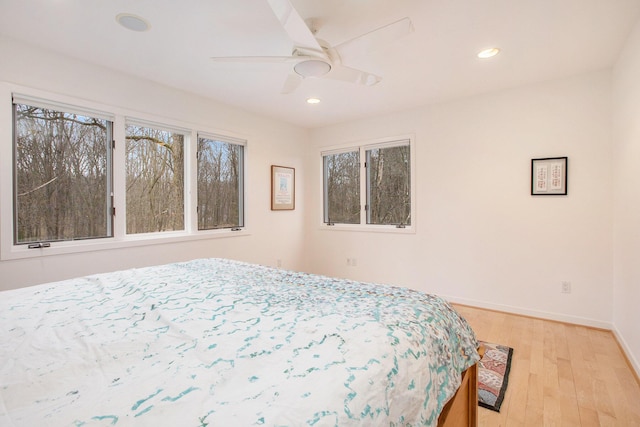 8023 Trail Rdg, Dexter, MI 48130 - bedroom with recessed lighting, light wood-style floors, and ceiling fan