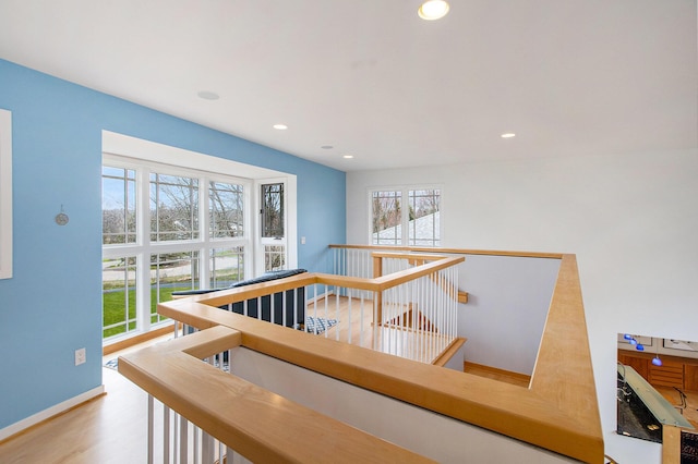 8023 Trail Rdg, Dexter, MI 48130 - corridor with an upstairs landing, recessed lighting, and wood finished floors