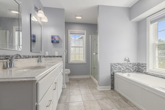 575 Autumns Way Blvd, Kalamazoo, MI 49009 - full bath featuring a garden tub, double vanity, and an enclosed shower