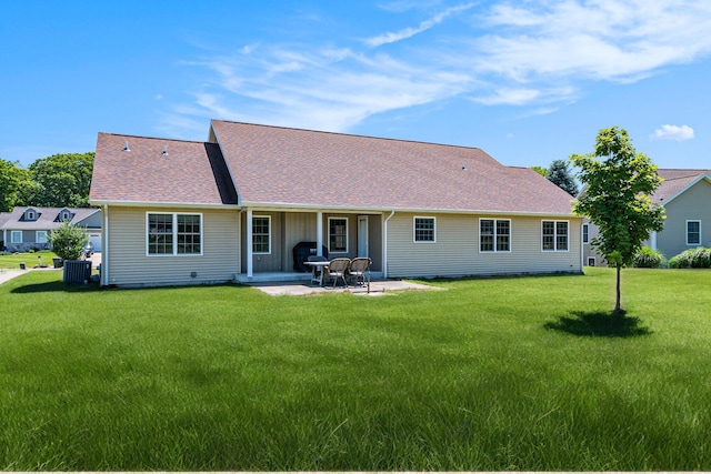 575 Autumns Way Blvd, Kalamazoo, MI 49009 - rear view of house with a yard, a patio, and roof with shingles