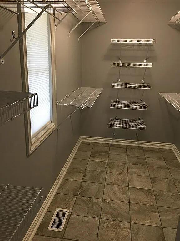 575 Autumns Way Blvd, Kalamazoo, MI 49009 - walk in closet with tile patterned flooring