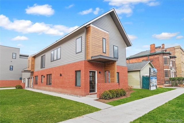 5216 Avery St, Detroit, MI 48208 - view of side of home with brick siding and a yard