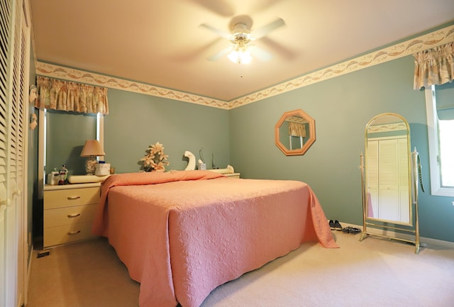 8141 N Elms Rd, Flushing, MI 48433 - bedroom featuring light colored carpet and ceiling fan
