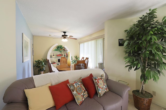 8141 N Elms Rd, Flushing, MI 48433 - carpeted living area featuring a ceiling fan