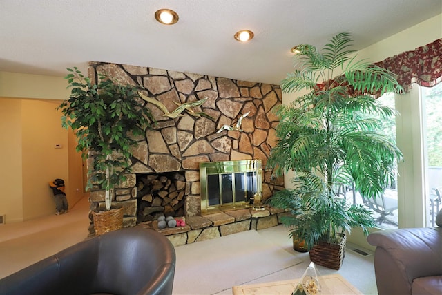 8141 N Elms Rd, Flushing, MI 48433 - living room featuring carpet flooring and a fireplace