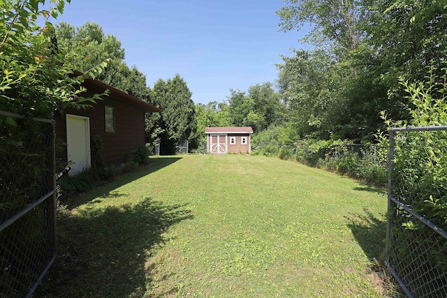 8141 N Elms Rd, Flushing, MI 48433 - view of yard featuring a shed