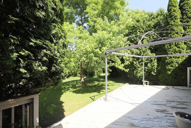 8141 N Elms Rd, Flushing, MI 48433 - view of green lawn with a wooden deck