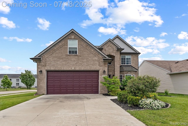 4074 Peach Tree Ln, Howell, MI 48843 - traditional-style house with brick siding, driveway, a garage, and a front lawn