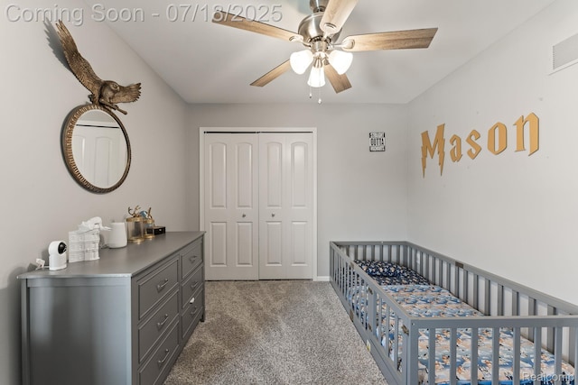 4074 Peach Tree Ln, Howell, MI 48843 - bedroom with carpet flooring, a closet, a nursery area, and a ceiling fan