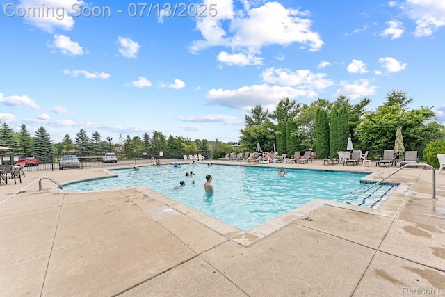 4074 Peach Tree Ln, Howell, MI 48843 - community pool featuring a patio