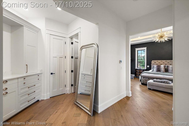 6295 Canter Creek Trl, Grand Blanc, MI 48439 - hallway featuring light wood finished floors