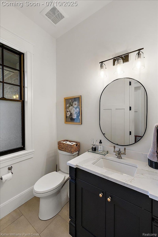 6295 Canter Creek Trl, Grand Blanc, MI 48439 - half bath featuring vanity and tile patterned flooring